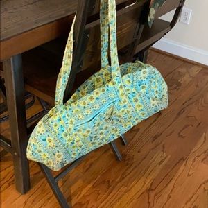 turquoise and green travel bag